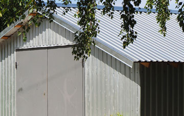 repairing Tydd Gote metal garage roofing
