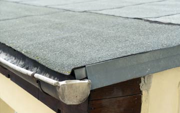 repair or replace Tydd Gote flat roofing?